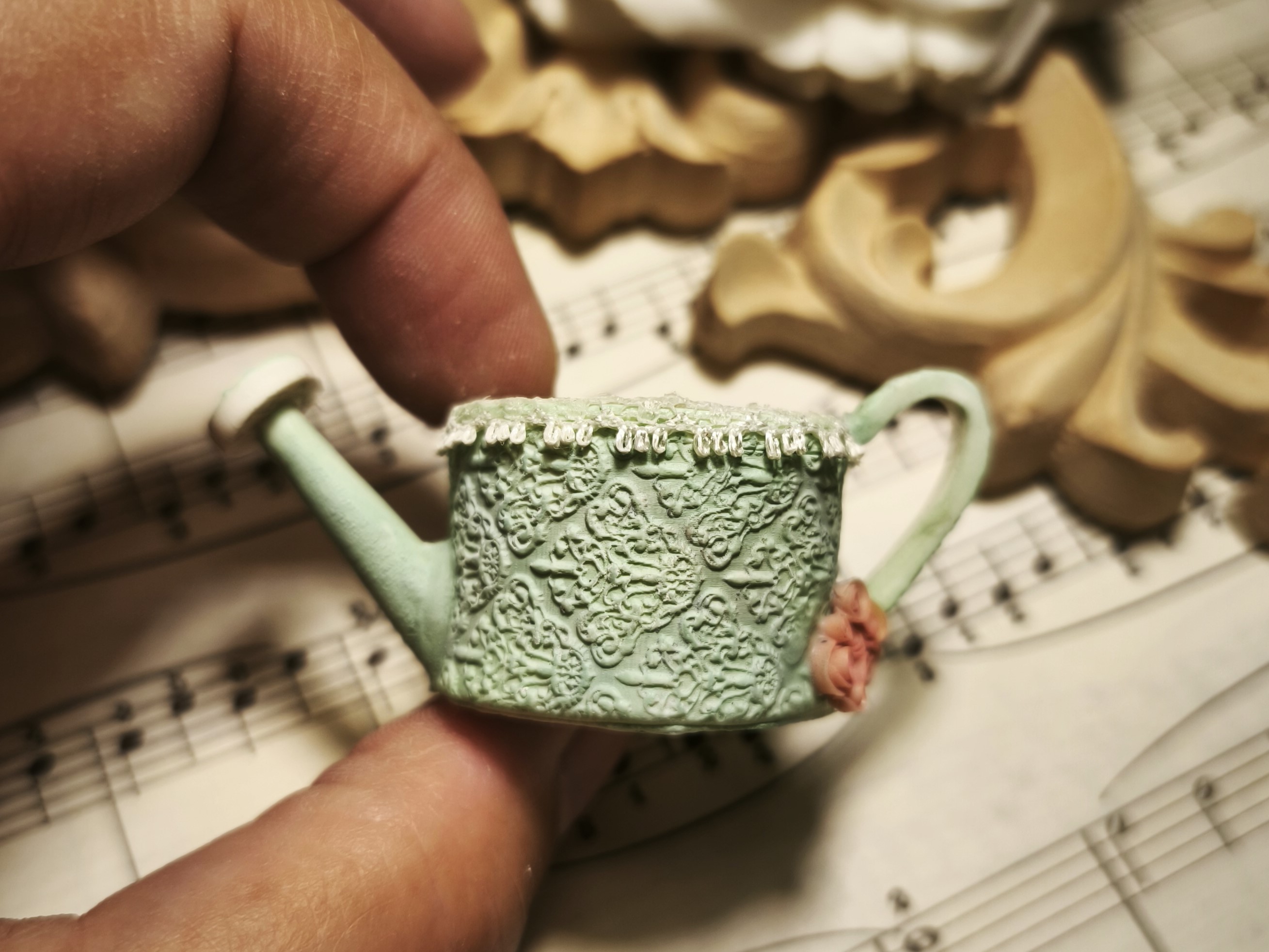 flowered watering can