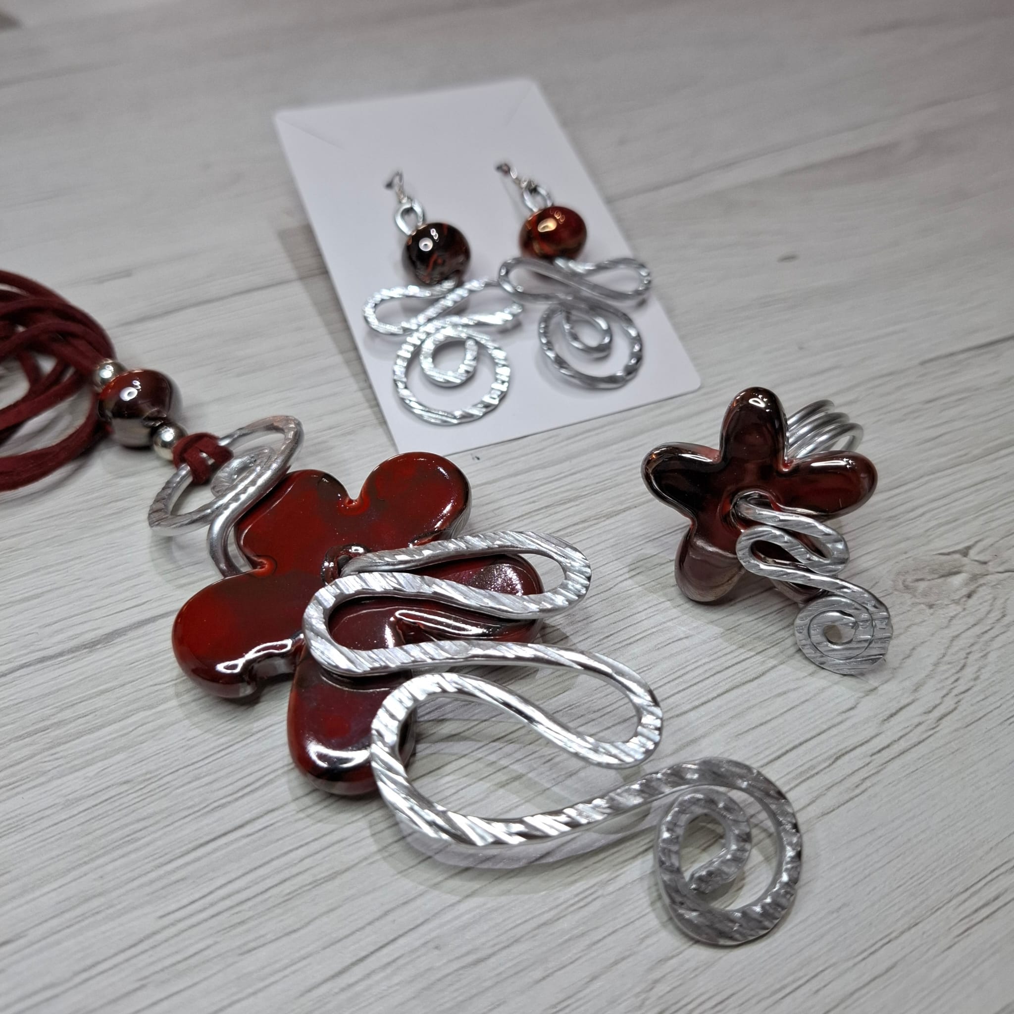 Ciondolo in alluminio e resina/ceramica